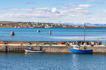 Fisherman boats in pier with Kilronan village in background