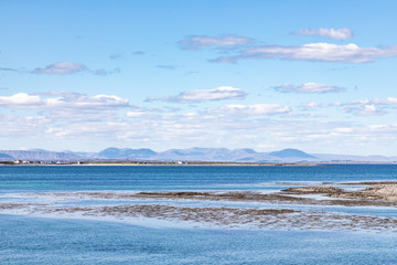 Ocean in Inishmore with Galway mountains background