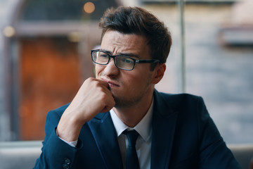 portrait of young man in sunglasses