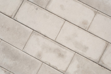 Brick pavement tile, top view. Light sidewalk, pavement texture