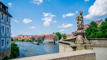 Bamberg's old historic city in Bavaria with statue of St. Cunegonde with a view of the old harbor