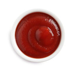 Delicious tomato sauce in bowl on white background, top view