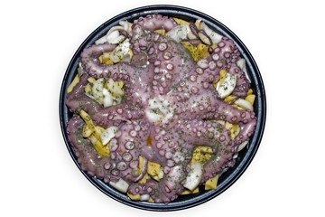 octopus with potatoes and onions isolated on white