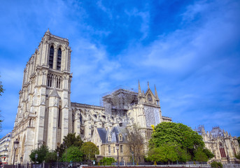 Fototapeta premium Notre Dame Cathedral on the Seine River in Paris, France after the fire on April 15, 2019.