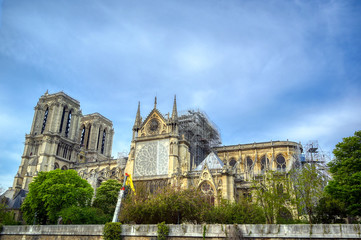 Fototapeta premium Notre Dame Cathedral on the Seine River in Paris, France after the fire on April 15, 2019.