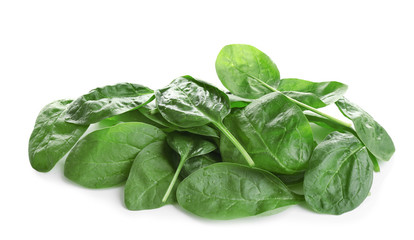 Heap of fresh green healthy baby spinach leaves isolated on white