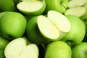 Fresh ripe green apples as background, closeup view