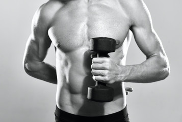 Naklejka premium muscular man lifting weights