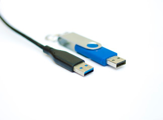 USB cable and usb flash memory isolated on the white background
