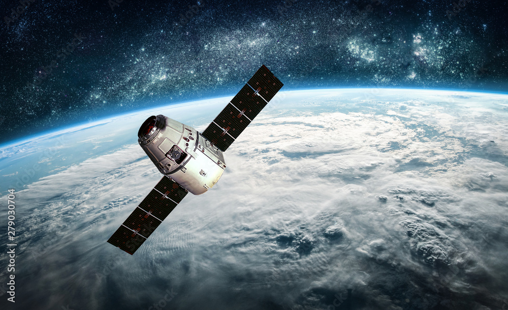 Aufkleber cargo spacecraft on orbit of the earth planet. milky way on background. space ship. elements of this