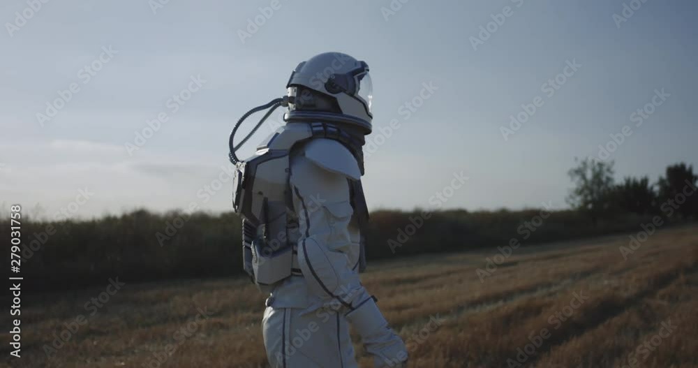 Canvas Prints man in space suit walking