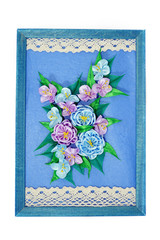 Bouquet of violet flowers on a blue background