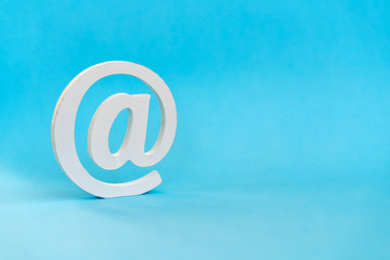 Email sign on blue background with real shadow.