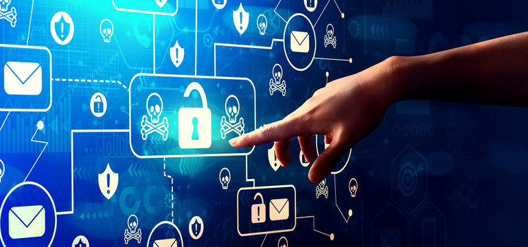 Email virus and scam theme with hand pressing a button on a technology screen