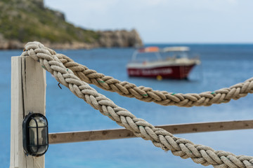 Rope around wooden restaurant platform