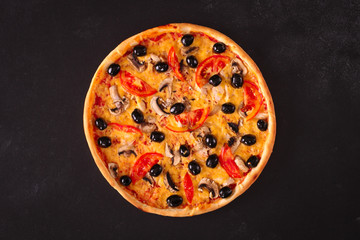 pizza (mushrooms, olives, chicken, tomato sauce, cheese). Top view. copy space