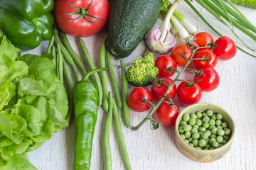 Healthy food in paper bag of different  vegetables on white background. Top view.
