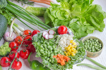 Healthy food in paper bag of different  vegetables on white background. Top view.