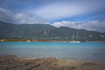 Yacht in the harbour on the Alykes Bay