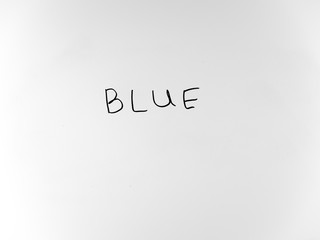 written in marker by hand text blue