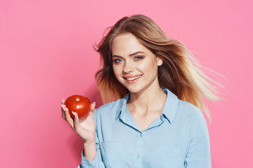 young woman with red apple