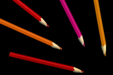 Old colored pencils lying on a black background - 279034307
