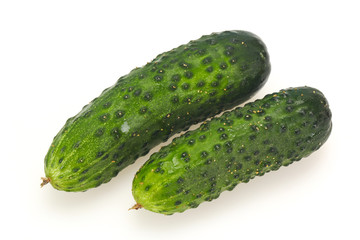 Ripe fresh green two cucumbers