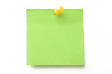 Fototapeta Posit de color verde y marcador amarillo clavado sobre fondo blanco obraz