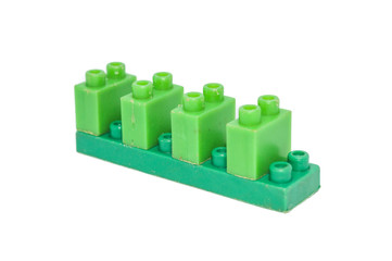 children's toy - building blocks in plastic color bricks, isolated on white background