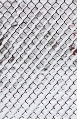 Snow covered chain link fence