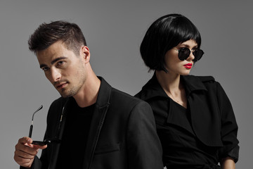 portrait of young man and woman