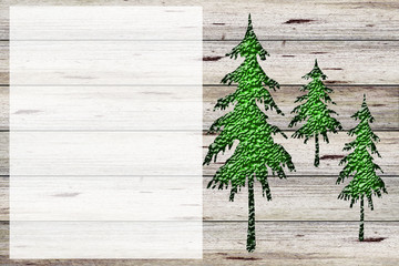 Three trees on wood plaque background