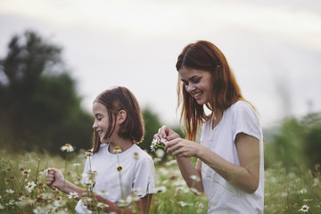 mother and daughter having fun in the park