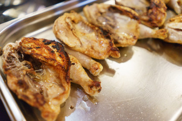 Process of cooking and roasting meat in a pan. 