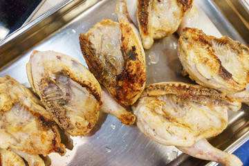Process of cooking and roasting meat in a pan. 