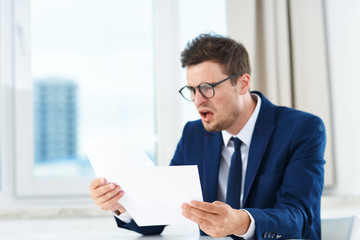 portrait of a businessman working in his office