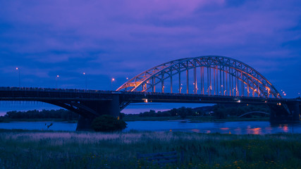 Fototapeta na wymiar The Waalbridge Nijmegen during Night