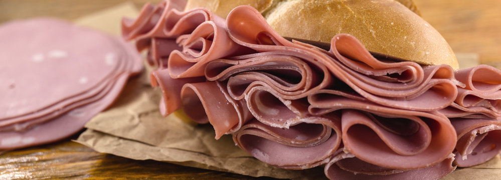 Traditional mortadella sandwich. Salt bread with bologna. Great snack of pork with bread, typical of Brazil.