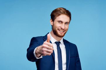 young businessman with thumb up