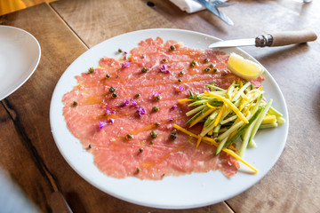 Beef carpaccio, beef tenderloin, zucchini, capers