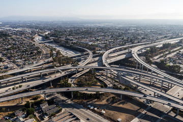 Aerial view of the Harbor 110 and Century 105 freeway interchange ramps and bridges near downtown...