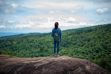 Naklejka premium man on the top of mountain