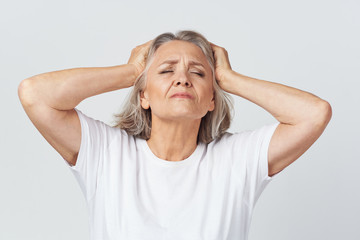 young woman with headache isolated on white