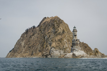 Fototapeta na wymiar Aniva lighthouse