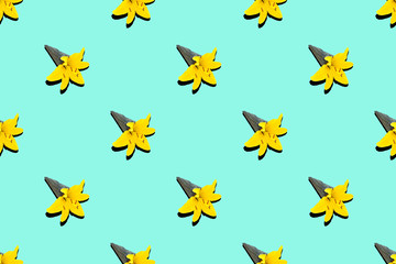 Pattern black ice cream cone with yellow lily flower on a blue background..