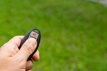 Car remote control on green