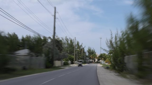 Hyperlapse shot filmed from the backseat of a golf cart in Bimini, Bahamas. Driving very fast around the island.