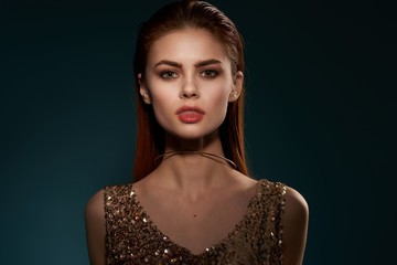 Fototapeta premium Beautiful woman charm golden dress