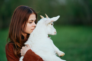 little girl with a goat