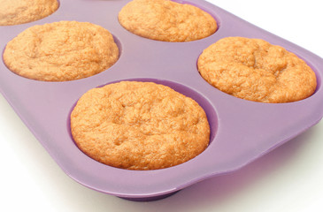 Fresh baked carrot muffins in silicone mold. Delicious dessert